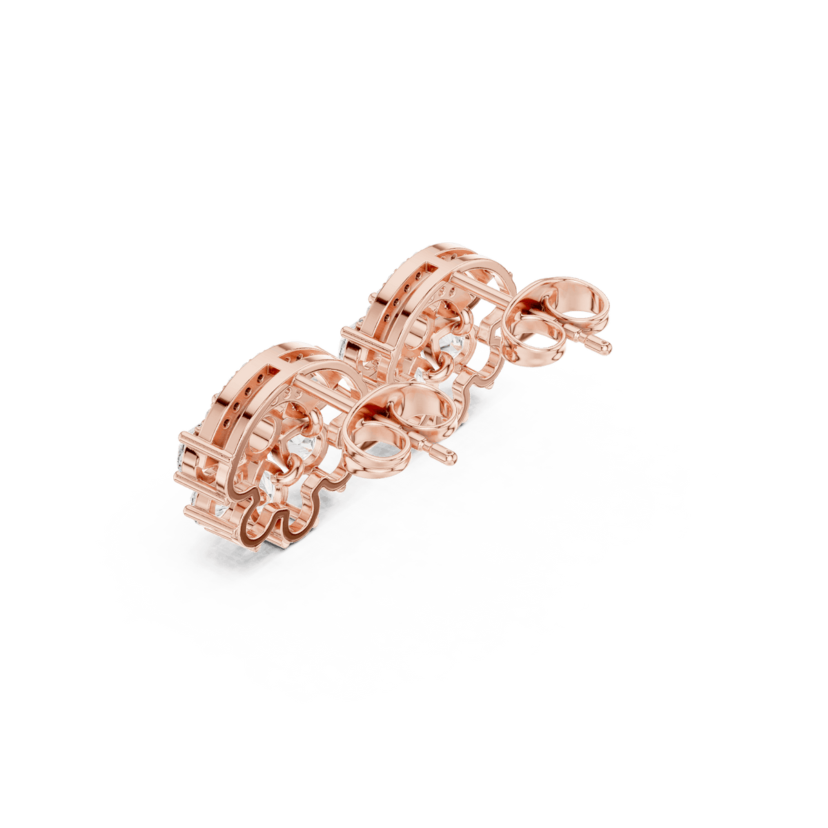 Baguette and round diamond cluster stud earrings featuring a modern geometric design with brilliant sparkling stones by Aortas Jewels.