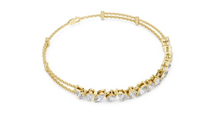 Marquise and emerald diamond tennis bracelet featuring mixed-cut sparkling stones in an elegant chain design by Aortas Jewels.