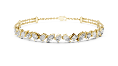 Marquise and emerald diamond tennis bracelet featuring mixed-cut sparkling stones in an elegant chain design by Aortas Jewels.