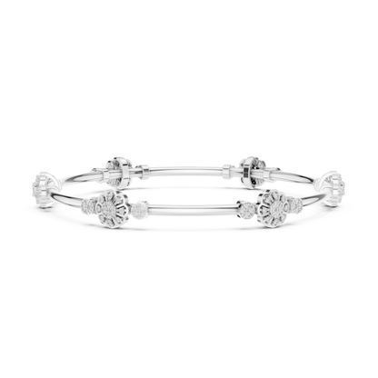 Floral charm crystal bangle bracelet featuring sparkling flower charms, decorative spacer beads, and a polished silver-tone finish by Aortas Jewels.