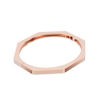 Geometric diamond bangle bracelet featuring a sleek octagonal design with a pavé-set diamond accent panel and polished finish by Aortas Jewels.