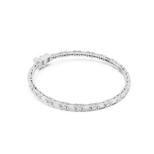 Baguette and round diamond tennis bracelet featuring alternating brilliant-cut stones with a secure box clasp by Aortas Jewels.