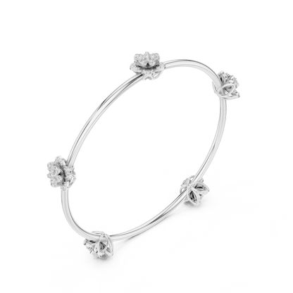 Blooming Floral & Leaf Crystal Bangle Bracelet featuring sparkling flower blossoms and leaf-inspired charms on a polished silver-tone open bangle by Aortas Jewels.
