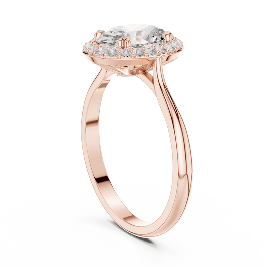 Classic halo diamond engagement ring featuring a brilliant round-cut center stone surrounded by a sparkling halo in a sleek cathedral-style setting by Aortas Jewels.