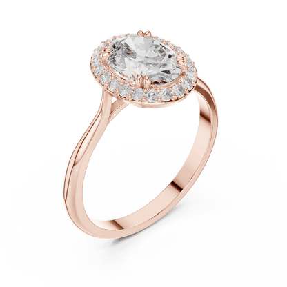 Classic halo diamond engagement ring featuring a brilliant round-cut center stone surrounded by a sparkling halo in a sleek cathedral-style setting by Aortas Jewels.