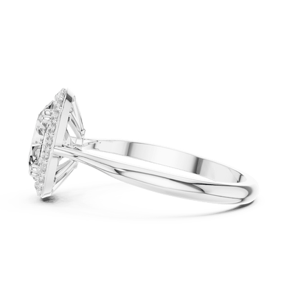 Classic halo diamond engagement ring featuring a brilliant round-cut center stone surrounded by a sparkling halo in a sleek cathedral-style setting by Aortas Jewels.