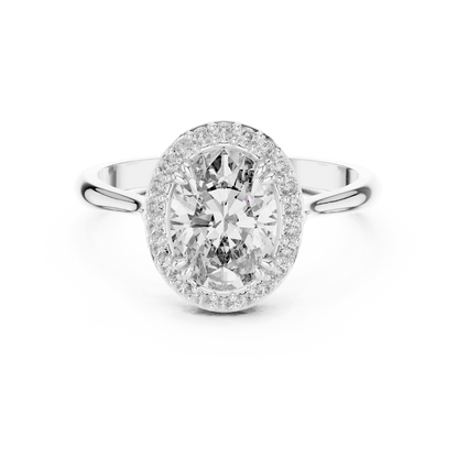 Classic halo diamond engagement ring featuring a brilliant round-cut center stone surrounded by a sparkling halo in a sleek cathedral-style setting by Aortas Jewels.