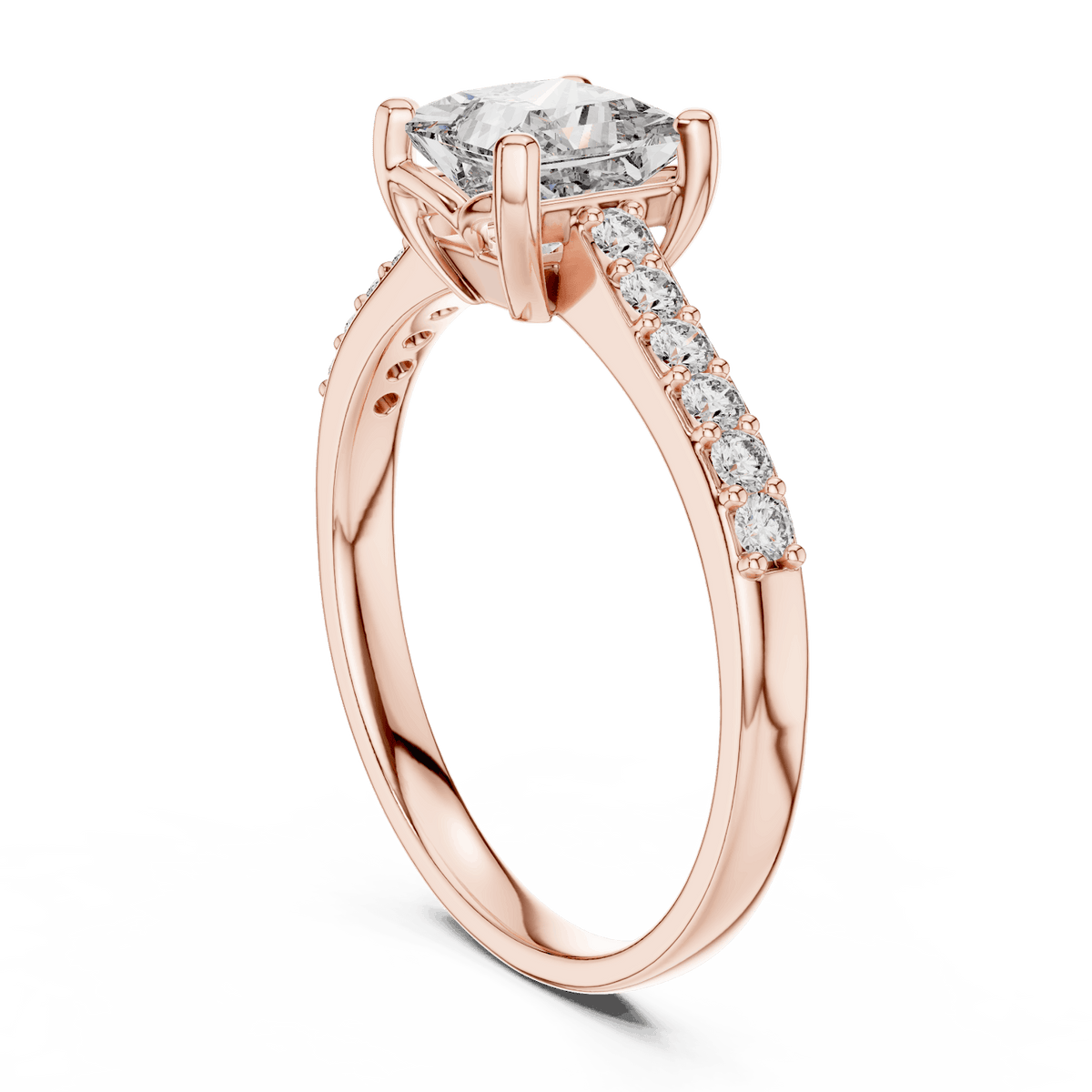 Classic pavé solitaire diamond engagement ring featuring a round-cut center stone in a four-prong setting with a sparkling pavé diamond band by Aortas Jewels.