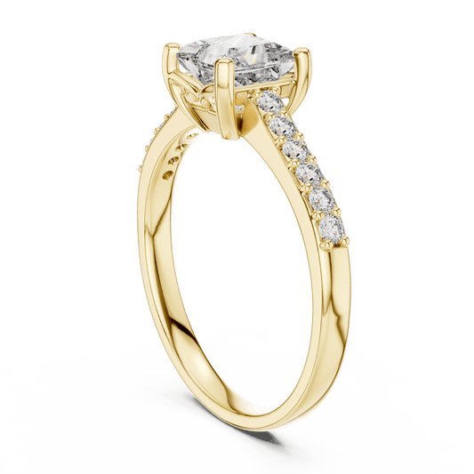Classic pavé solitaire diamond engagement ring featuring a round-cut center stone in a four-prong setting with a sparkling pavé diamond band by Aortas Jewels.