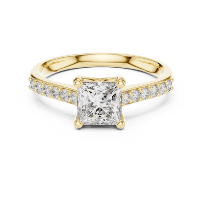 Classic pavé solitaire diamond engagement ring featuring a round-cut center stone in a four-prong setting with a sparkling pavé diamond band by Aortas Jewels.