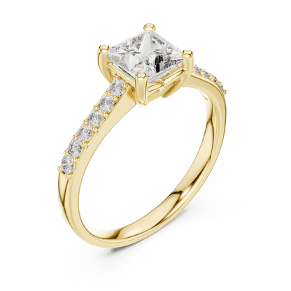 Classic pavé solitaire diamond engagement ring featuring a round-cut center stone in a four-prong setting with a sparkling pavé diamond band by Aortas Jewels.