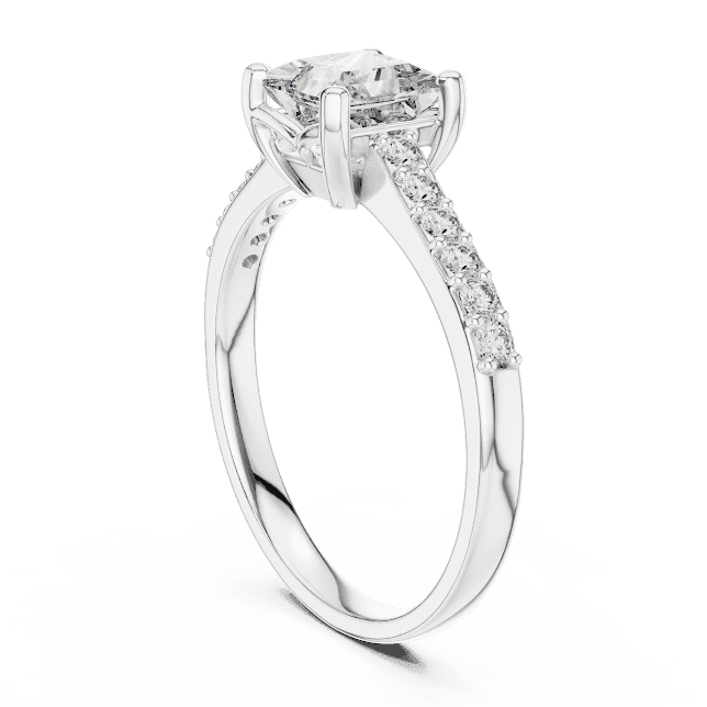 Classic pavé solitaire diamond engagement ring featuring a round-cut center stone in a four-prong setting with a sparkling pavé diamond band by Aortas Jewels.