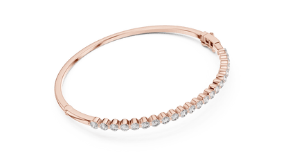Classic round diamond hinged bangle featuring brilliant round-cut diamonds set along a polished white gold bracelet with a secure clasp by Aortas Jewels.