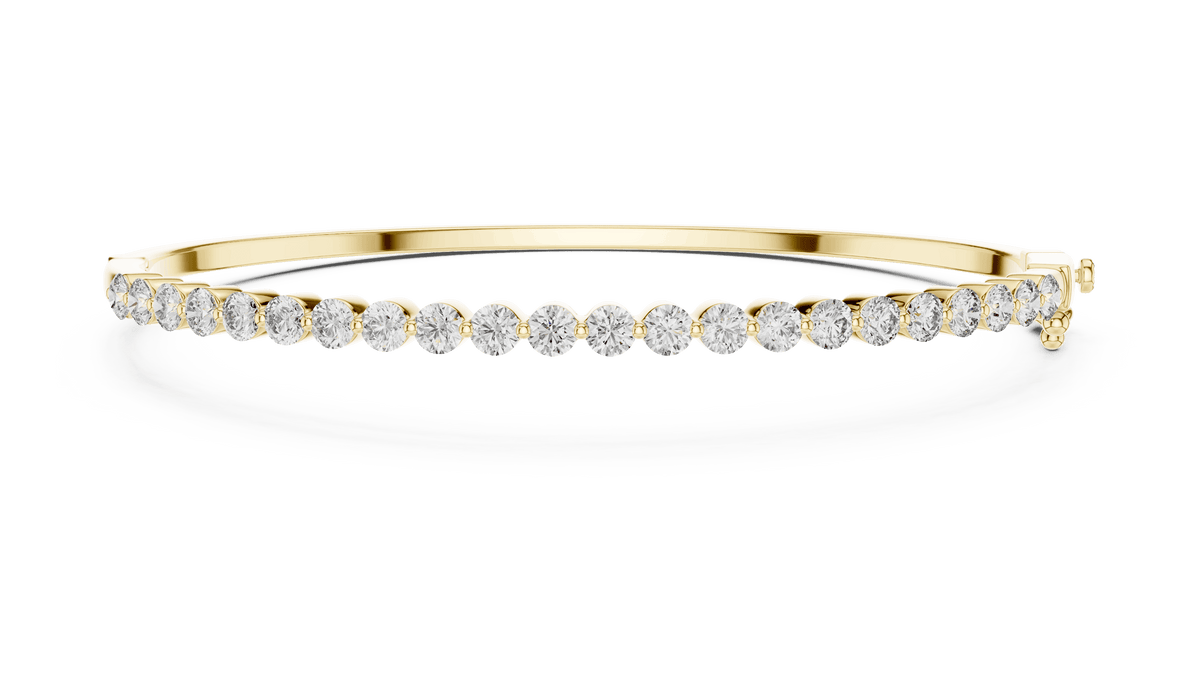 Classic round diamond hinged bangle featuring brilliant round-cut diamonds set along a polished white gold bracelet with a secure clasp by Aortas Jewels.
