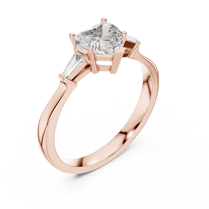Classic solitaire diamond engagement ring featuring a round brilliant center stone in a four-prong setting with a polished band by Aortas Jewels.