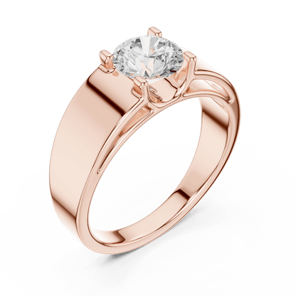 Classic solitaire diamond engagement ring featuring a brilliant round-cut stone in a four-prong setting with a sleek polished band by Aortas Jewels.