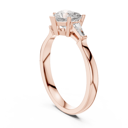 Classic solitaire diamond engagement ring featuring a round brilliant center stone in a four-prong setting with a polished band by Aortas Jewels.