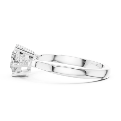 Classic solitaire diamond engagement ring featuring a round brilliant center stone in a four-prong setting with a polished band by Aortas Jewels.