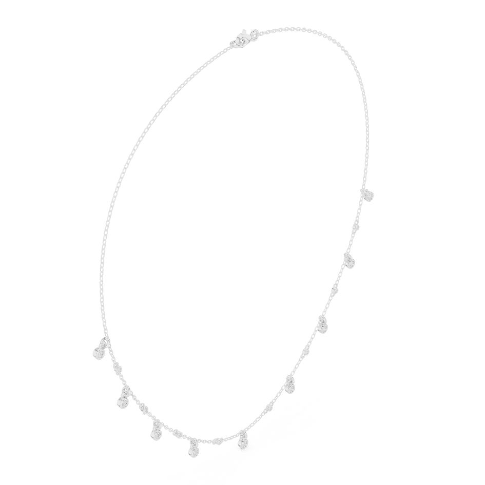 Dainty diamond dangle necklace featuring delicate sparkling drop charms on a fine chain by Aortas Jewels.