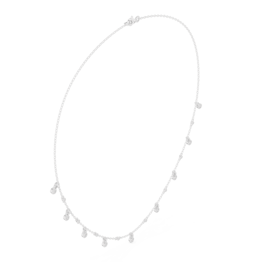 Dainty diamond dangle necklace featuring delicate sparkling drop charms on a fine chain by Aortas Jewels.