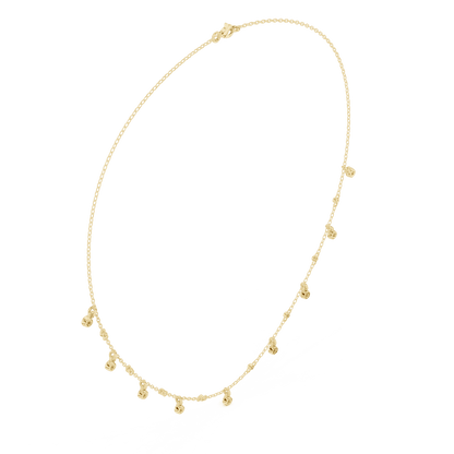 Dainty diamond dangle necklace featuring delicate sparkling drop charms on a fine chain by Aortas Jewels.