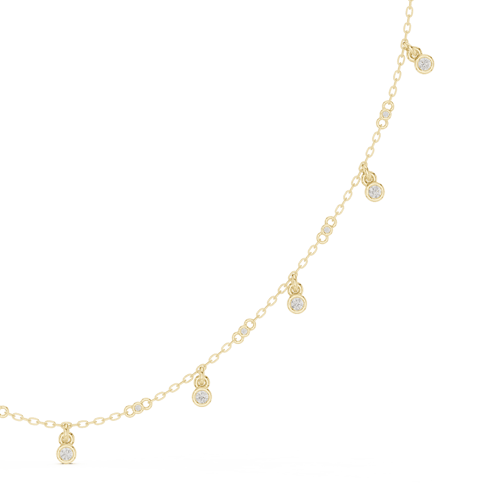 Dainty diamond dangle necklace featuring delicate sparkling drop charms on a fine chain by Aortas Jewels.