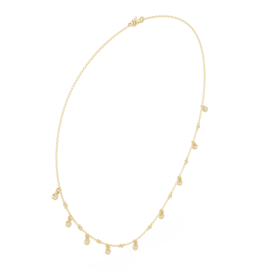 Dainty diamond dangle necklace featuring delicate sparkling drop charms on a fine chain by Aortas Jewels.