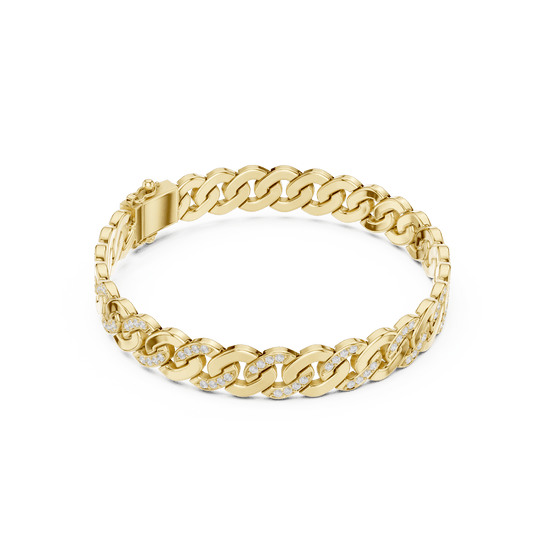 Diamond Cuban link chain bracelet featuring polished interlocking links with sparkling stone accents and a secure box clasp by Aortas Jewels.