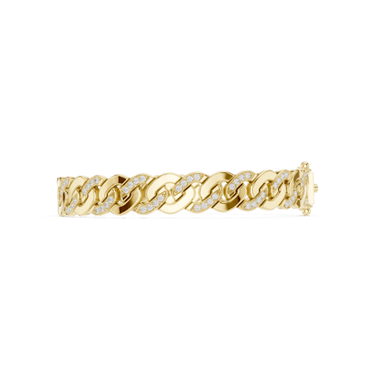 Diamond Cuban link chain bracelet featuring polished interlocking links with sparkling stone accents and a secure box clasp by Aortas Jewels.