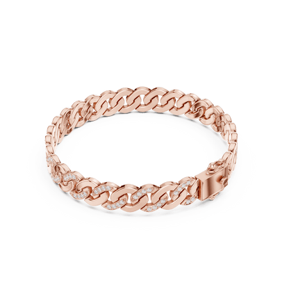 Diamond Cuban link chain bracelet featuring polished interlocking links with sparkling stone accents and a secure box clasp by Aortas Jewels.