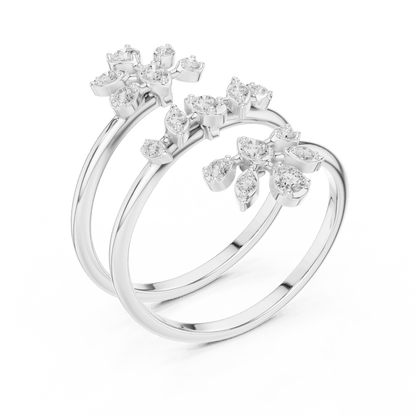 Diamond floral hoop earrings featuring sparkling flower-shaped diamond clusters on sleek polished hoops by Aortas Jewels.