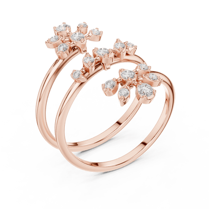 Diamond floral hoop earrings featuring sparkling flower-shaped diamond clusters on sleek polished hoops by Aortas Jewels.
