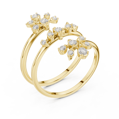 Diamond floral hoop earrings featuring sparkling flower-shaped diamond clusters on sleek polished hoops by Aortas Jewels.
