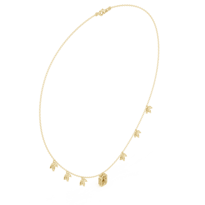 Emerald-cut diamond charm necklace featuring a delicate chain with sparkling station accents and a modern centerpiece by Aortas Jewels.