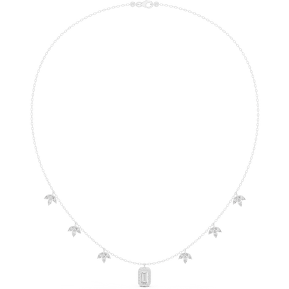 Emerald-cut diamond charm necklace featuring a delicate chain with sparkling station accents and a modern centerpiece by Aortas Jewels.