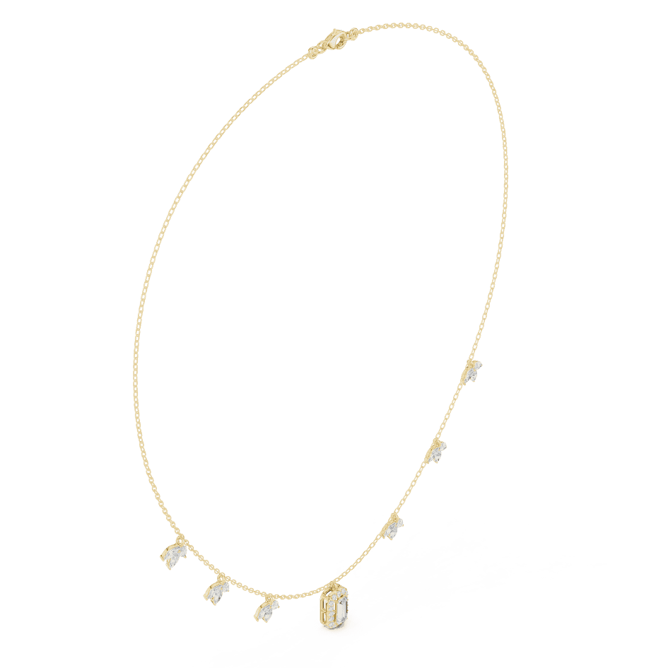 Emerald-cut diamond charm necklace featuring a delicate chain with sparkling station accents and a modern centerpiece by Aortas Jewels.