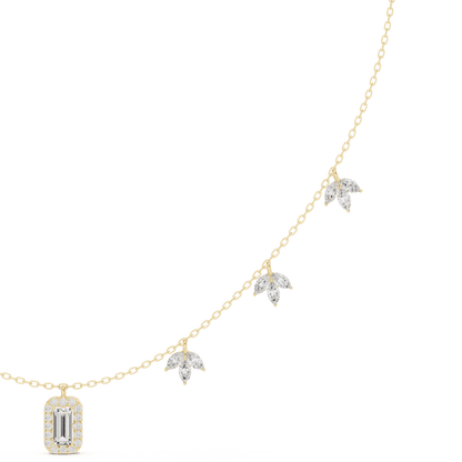 Emerald-cut diamond charm necklace featuring a delicate chain with sparkling station accents and a modern centerpiece by Aortas Jewels.