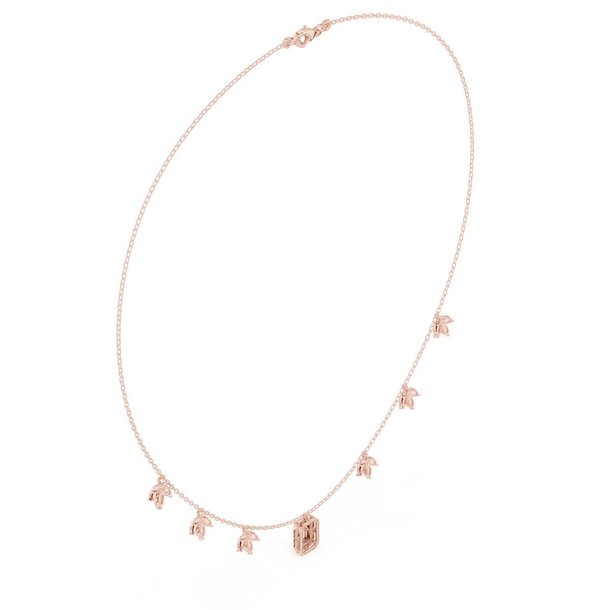 Emerald-cut diamond charm necklace featuring a delicate chain with sparkling station accents and a modern centerpiece by Aortas Jewels.