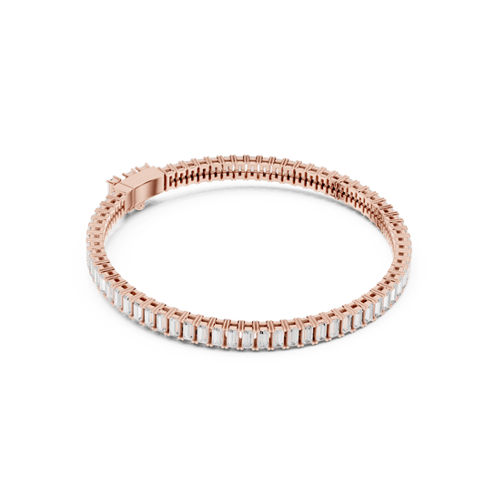 Emerald-cut diamond tennis bracelet featuring a continuous row of sparkling rectangular stones with a secure box clasp by Aortas Jewels.