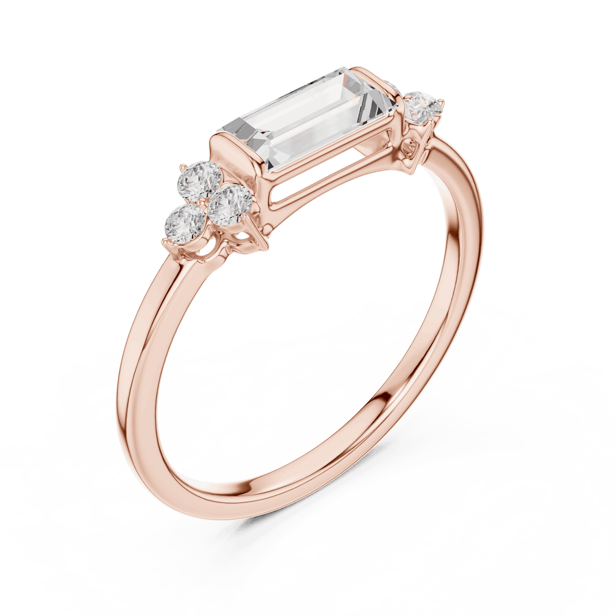 Emerald Cut Diamond Three-Stone Engagement Ring featuring an emerald-cut center stone with round diamond side accents on a polished band by Aortas Jewels.