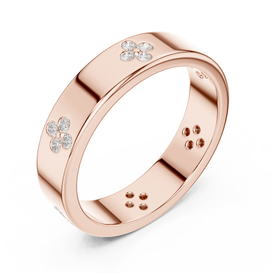 Floral Diamond Comfort Fit Wedding Band featuring delicate round diamond flower clusters on a wide polished band by Aortas Jewels.