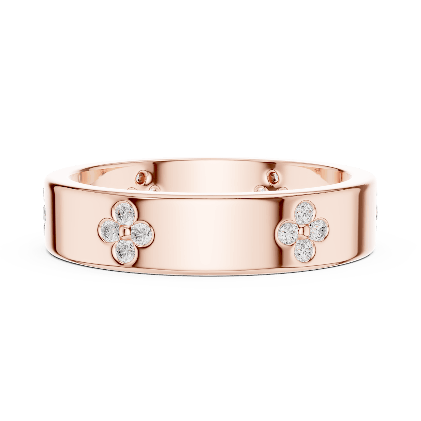 Floral Diamond Comfort Fit Wedding Band featuring delicate round diamond flower clusters on a wide polished band by Aortas Jewels.