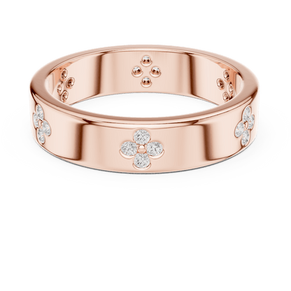 Floral Diamond Comfort Fit Wedding Band featuring delicate round diamond flower clusters on a wide polished band by Aortas Jewels.