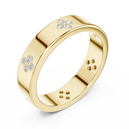 Floral Diamond Comfort Fit Wedding Band featuring delicate round diamond flower clusters on a wide polished band by Aortas Jewels.