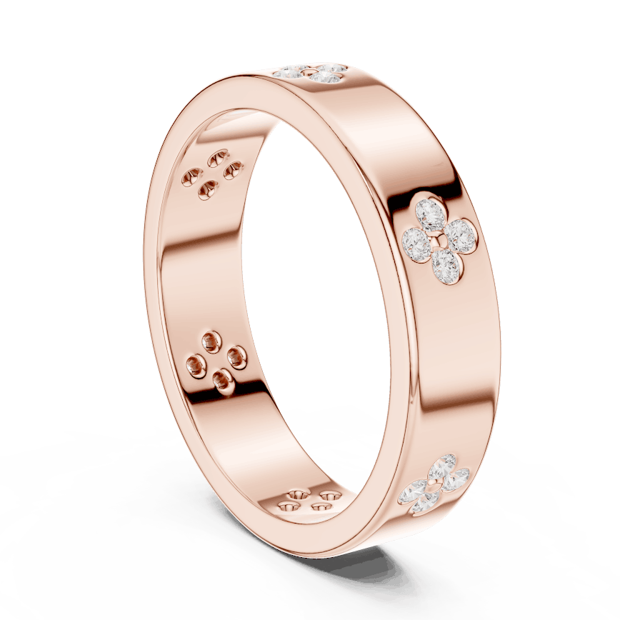 Floral Diamond Comfort Fit Wedding Band featuring delicate round diamond flower clusters on a wide polished band by Aortas Jewels.