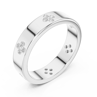 Floral Diamond Comfort Fit Wedding Band featuring delicate round diamond flower clusters on a wide polished band by Aortas Jewels.