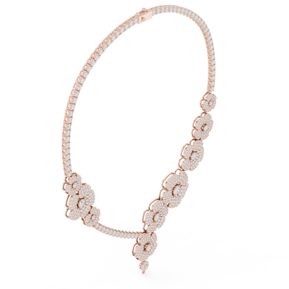 Floral diamond statement necklace featuring sparkling flower motifs and an elegant drop centerpiece by Aortas Jewels.