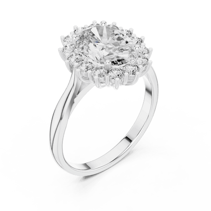 Floral halo solitaire diamond engagement ring featuring a brilliant round-cut center stone surrounded by a sparkling halo in an elegant cathedral-style setting by Aortas Jewels.