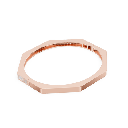 Geometric diamond bangle bracelet featuring a sleek octagonal design with a pavé-set diamond accent panel and polished finish by Aortas Jewels.