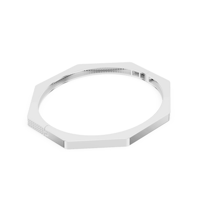 Geometric diamond bangle bracelet featuring a sleek octagonal design with a pavé-set diamond accent panel and polished finish by Aortas Jewels.